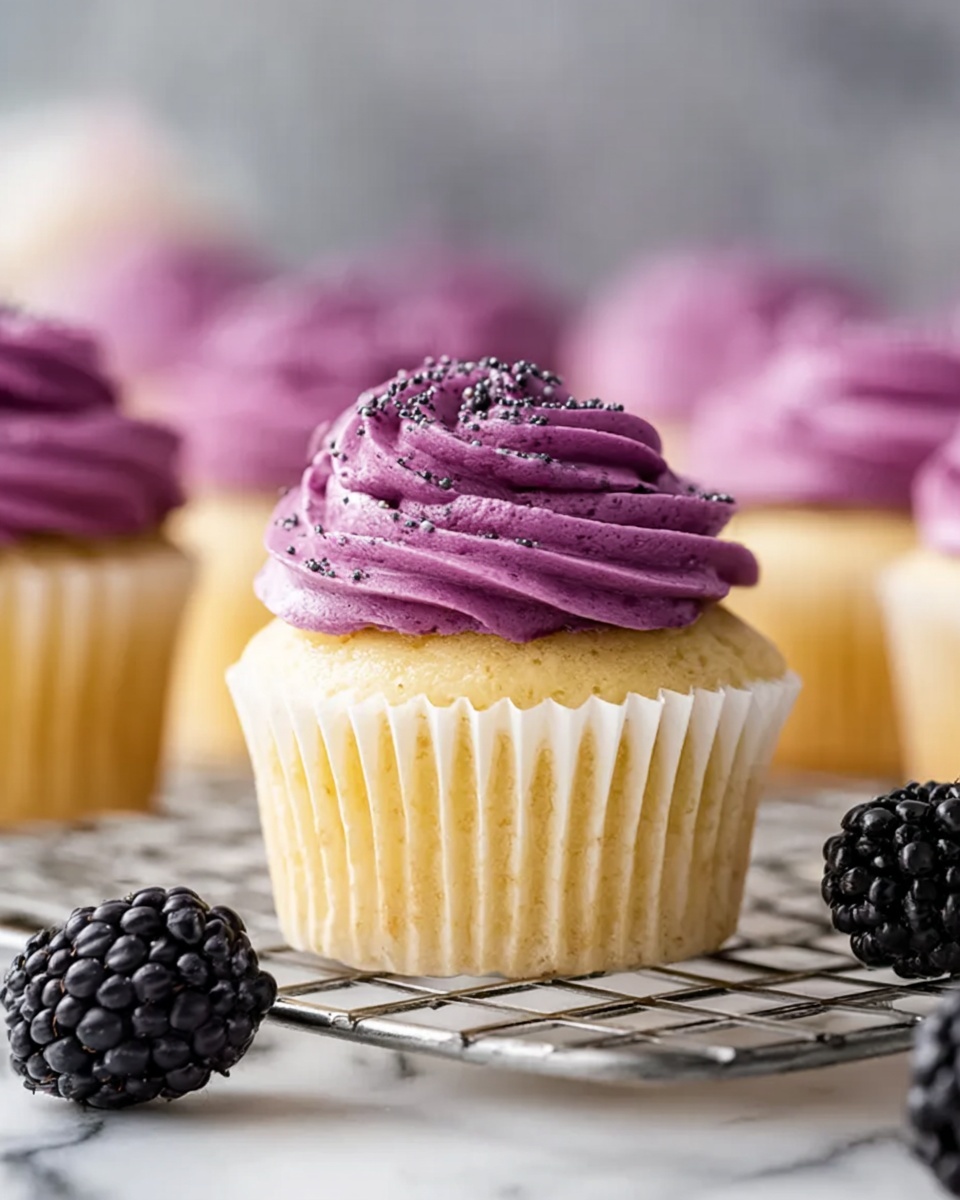 Lemon Poppy Seed Cupcakes with Blackberry Frosting Recipe - Recipe Image